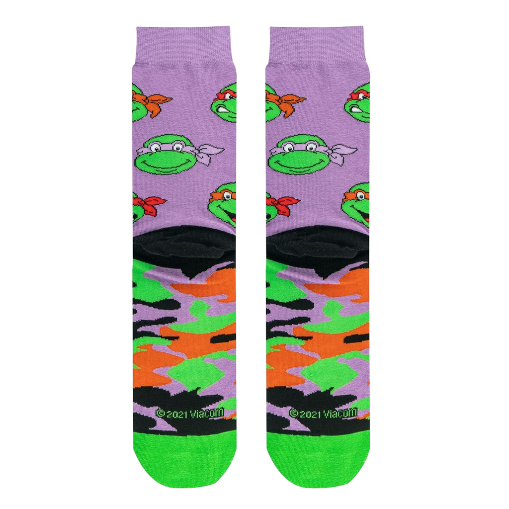 Close-up of the TMNT Turtle Camo crew socks, showing the design and the brand's copyright information.