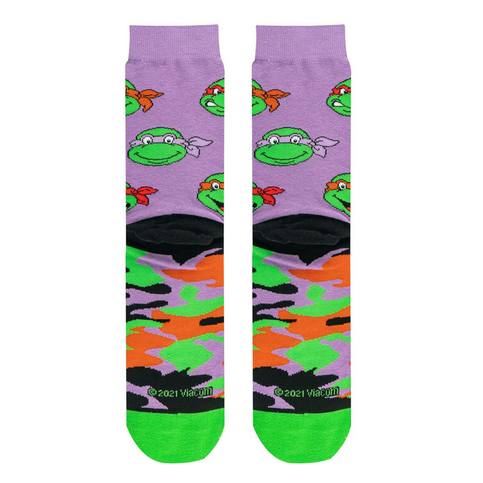 Close-up of the TMNT Turtle Camo crew socks, showing the design and the brand's copyright information.