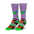 Pair of crew socks. Lavender background with repeating TMNT face pattern and orange, green, and black camouflage print on the lower part. 