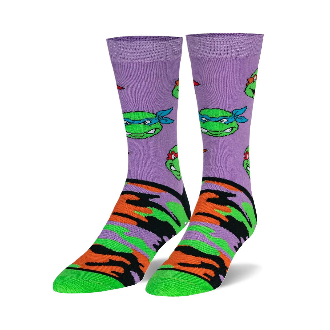 Pair of crew socks. Lavender background with repeating TMNT face pattern and orange, green, and black camouflage print on the lower part. 