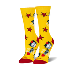 Pair of women's crew socks, yellow with red stars, Betty Boop images, and 'Ooh La La' text.