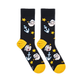 Flat lay of black socks showing Popeye's face with a pipe, light blue anchors, yellow stars, and yellow heels and toes.