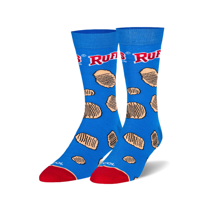 A pair of blue crew socks featuring scattered Ruffles potato chips and the red Ruffles brand logo. Red heel and toe.