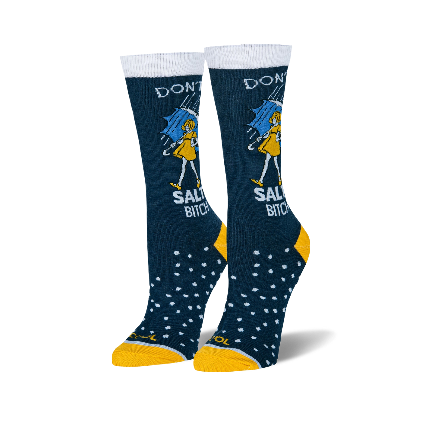 Pair of women's crew socks. Dark blue with white text reading 'Don't be a Salty Bitch', yellow girl illustration under an umbrella, and white polka dots. Yellow cuffs.