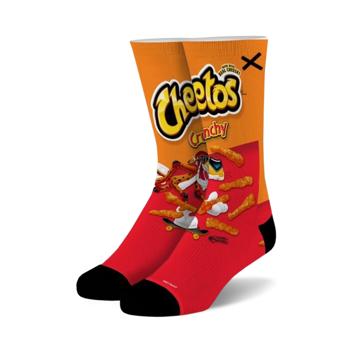 cheetos bag art socks - scrumptious red socks emblazoned with a vibrant cheetos bag print, featuring chester cheetah's grinning face. toe and heel are black. }}