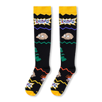 Flat lay of black knee-high socks highlighting Tommy Pickles, Reptar on the side, and the Rugrats logo near a yellow cuff.
