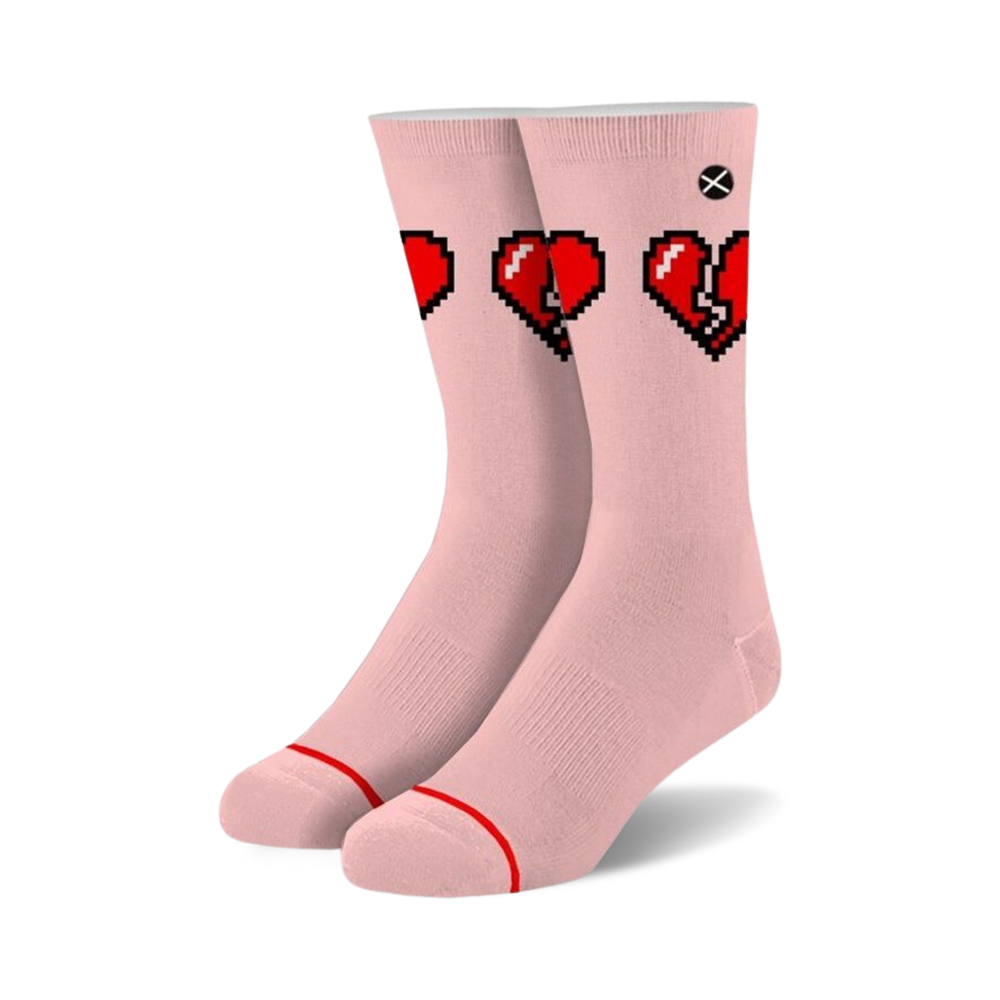 Pair of blush pink crew socks with a graphic of three pixelated hearts; two whole, one broken.  Red and black pixel art on a light pink background.