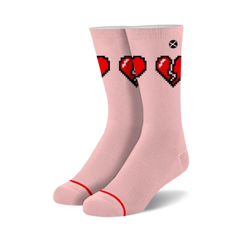 pixelated red broken hearts on pink crew socks. for men and women.   