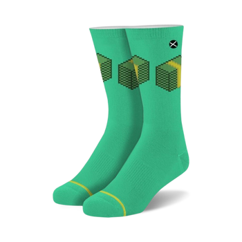 pixel money stacks crew socks in green feature 8bit yellow money stack pattern with black outline. unisex novelty socks for men and women.   
