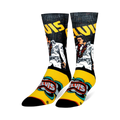Crew socks featuring Elvis in a white jumpsuit with a lei on a black background, plus retro yellow and blue graphics on foot.