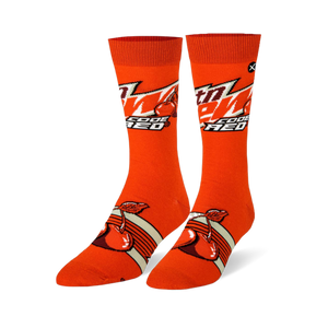 Orange crew socks featuring the Mtn Dew Code Red logo on the calf and large red cherries over retro stripes on the foot.