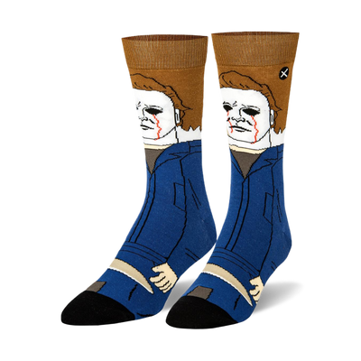 Pair of crew socks with Michael Myers in a blue jumpsuit, white mask with red streaks, brown hair, and holding a knife.