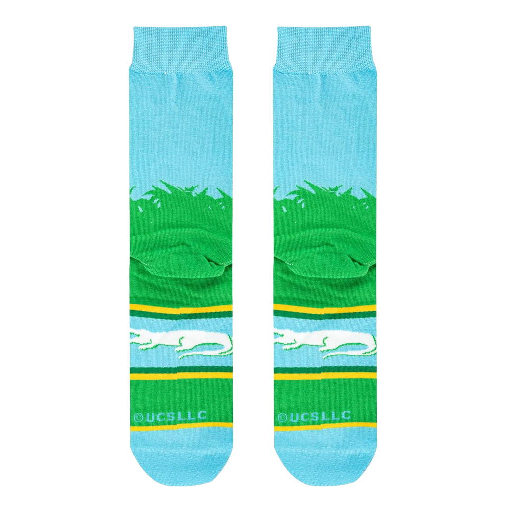 Flat lay showcasing the full Happy Gilmore sock design, highlighting the details of the golf ball, grass, and alligator graphic.