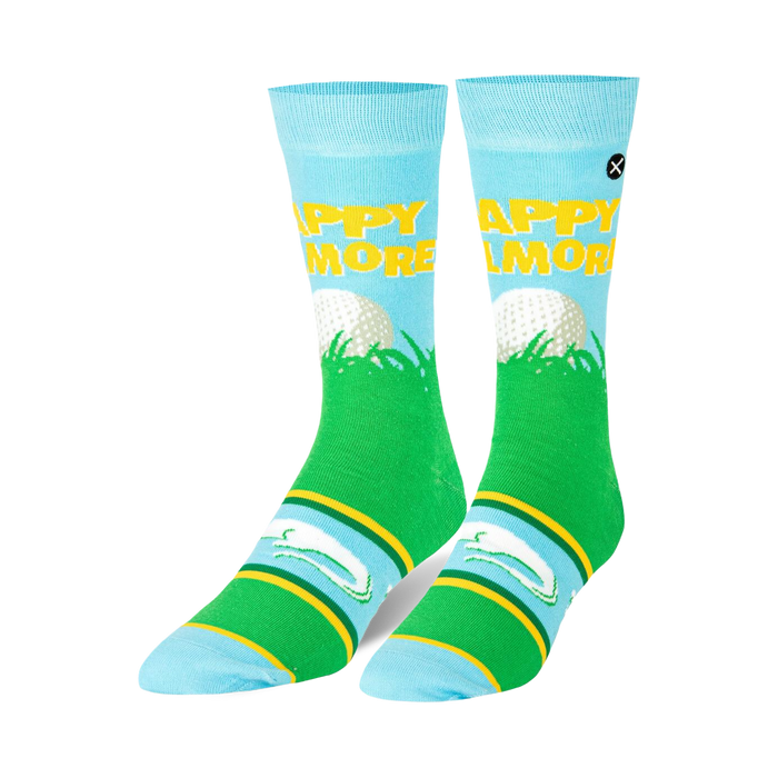 Pair of Happy Gilmore crew socks. Light blue with green, yellow and white accents. Features a golf ball, Happy Gilmore text and alligators.