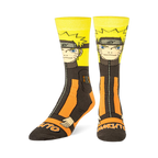 Crew socks angled to show Naruto's orange and black suit design wrapping around the side, with Naruto text on the dark toe.