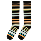 Flat lay of two knee-high socks side-by-side, displaying varied horizontal stripes in brown, green, blue, and peach.