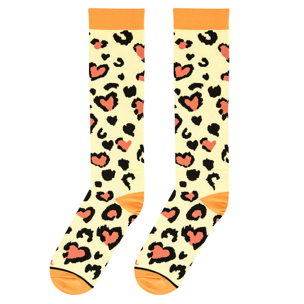 Top-down view of cream socks featuring black leopard spots with coral hearts and matching bright orange cuffs.