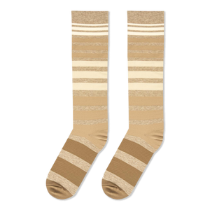 Flat lay presentation of tan, brown, and cream striped tall socks showing the full length and heel construction.