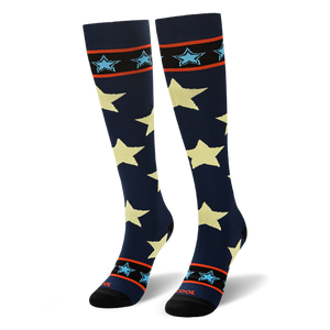 Angled view of navy socks standing upright to show the striped band near the black toe with the word COOL in red.