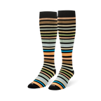 Pair of knee-high socks displayed upright, showing the multi-colored earthy stripes wrapping around the leg and foot.