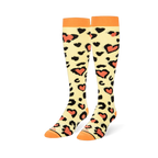 Knee-high socks in pale cream with black leopard print spots surrounding coral hearts, plus solid orange cuffs, heels and toes.