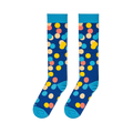 Flat lay of two long navy blue socks with large colorful polka dots side by side, showing the light blue cuffs and toes.