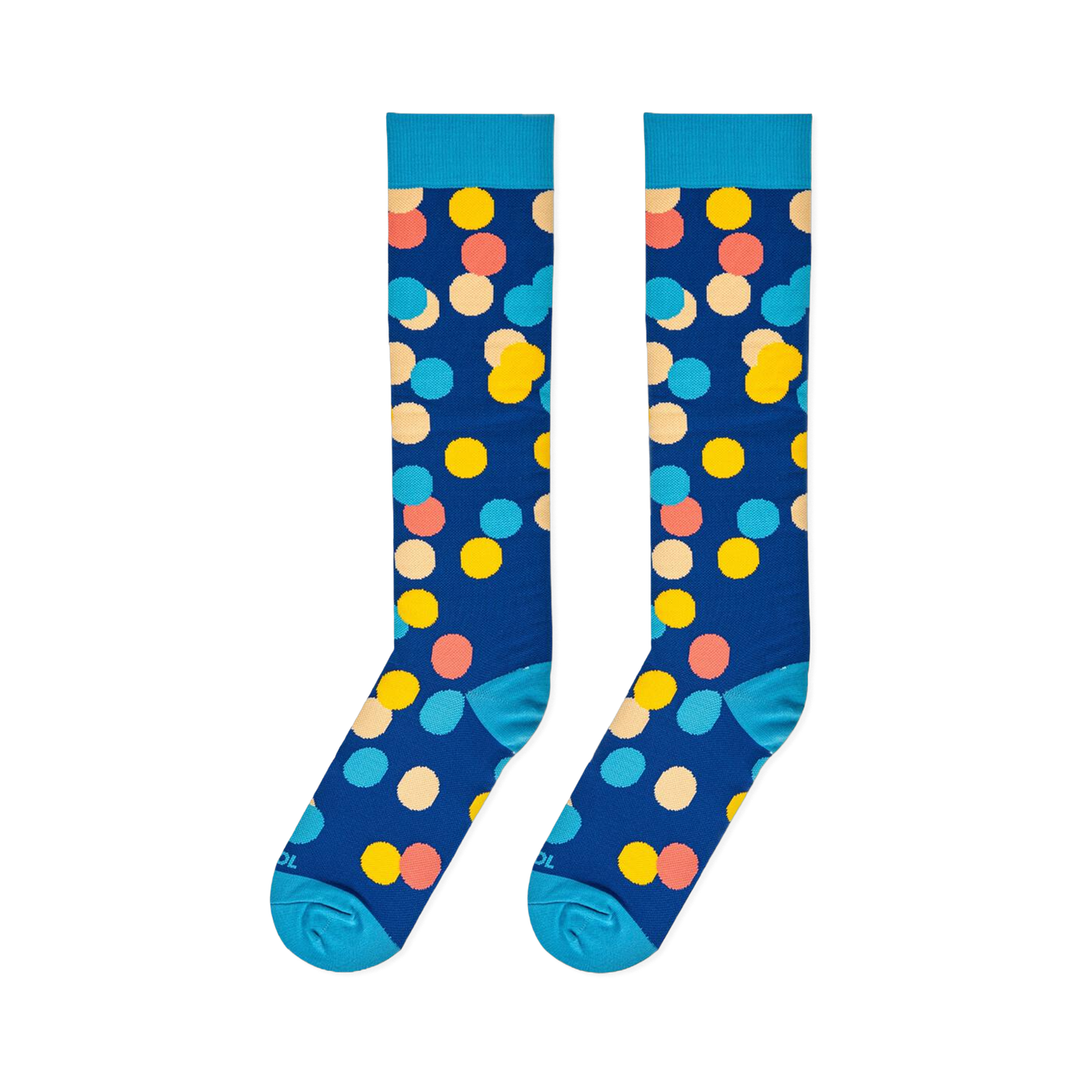 Flat lay of two long navy blue socks with large colorful polka dots side by side, showing the light blue cuffs and toes.