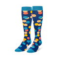 Knee-high navy blue socks with large yellow, peach, coral, and light blue polka dots, finished with bright blue cuffs.