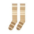 Flat lay view of knee-high socks with gradient brown and cream horizontal stripes against a black background.