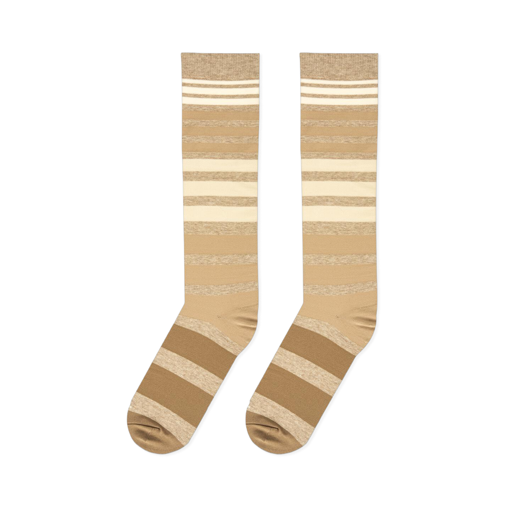 Flat lay view of knee-high socks with gradient brown and cream horizontal stripes against a black background.