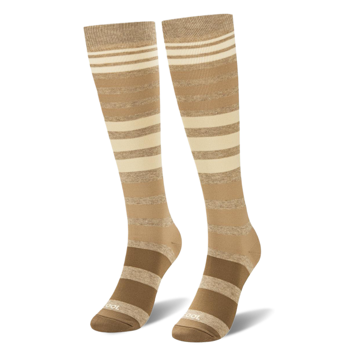 Knee-high socks featuring an ombre horizontal stripe pattern fading from dark brown at the bottom to light cream at the top.