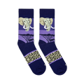 Flat lay of blue and purple socks showing an elephant face, black savanna tree silhouettes, and beige textured footband.