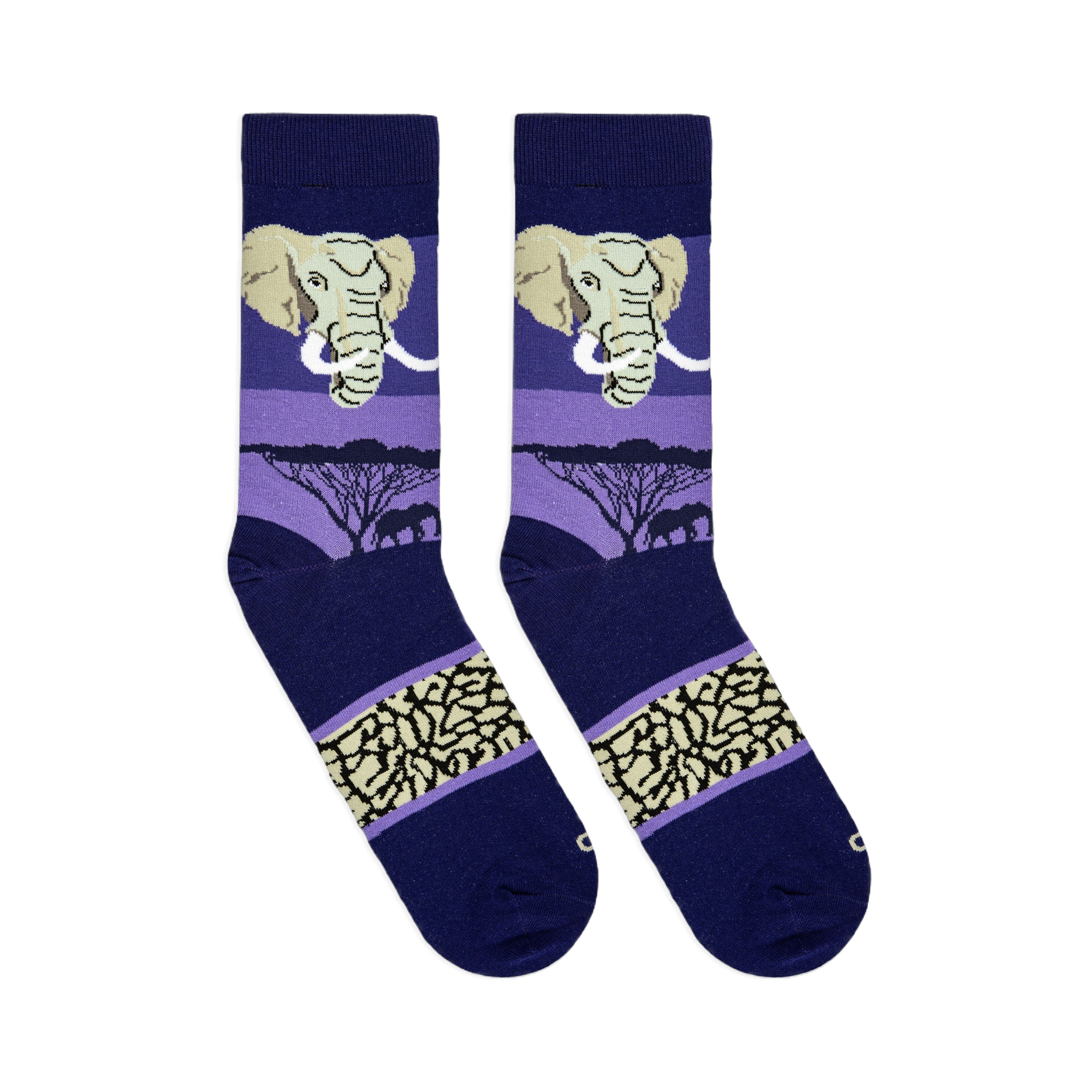 Flat lay of blue and purple socks showing an elephant face, black savanna tree silhouettes, and beige textured footband.