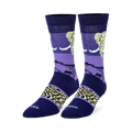 Dark blue and purple crew socks featuring an elephant head, black savanna silhouettes, and a beige wrinkled skin pattern.