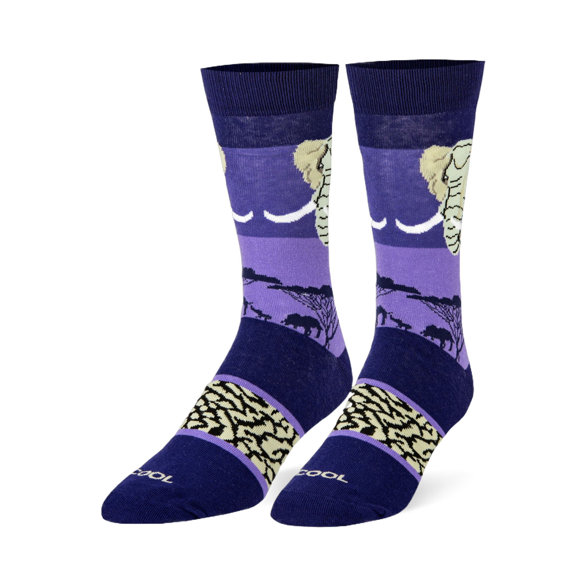 Dark blue and purple crew socks featuring an elephant head, black savanna silhouettes, and a beige wrinkled skin pattern.
