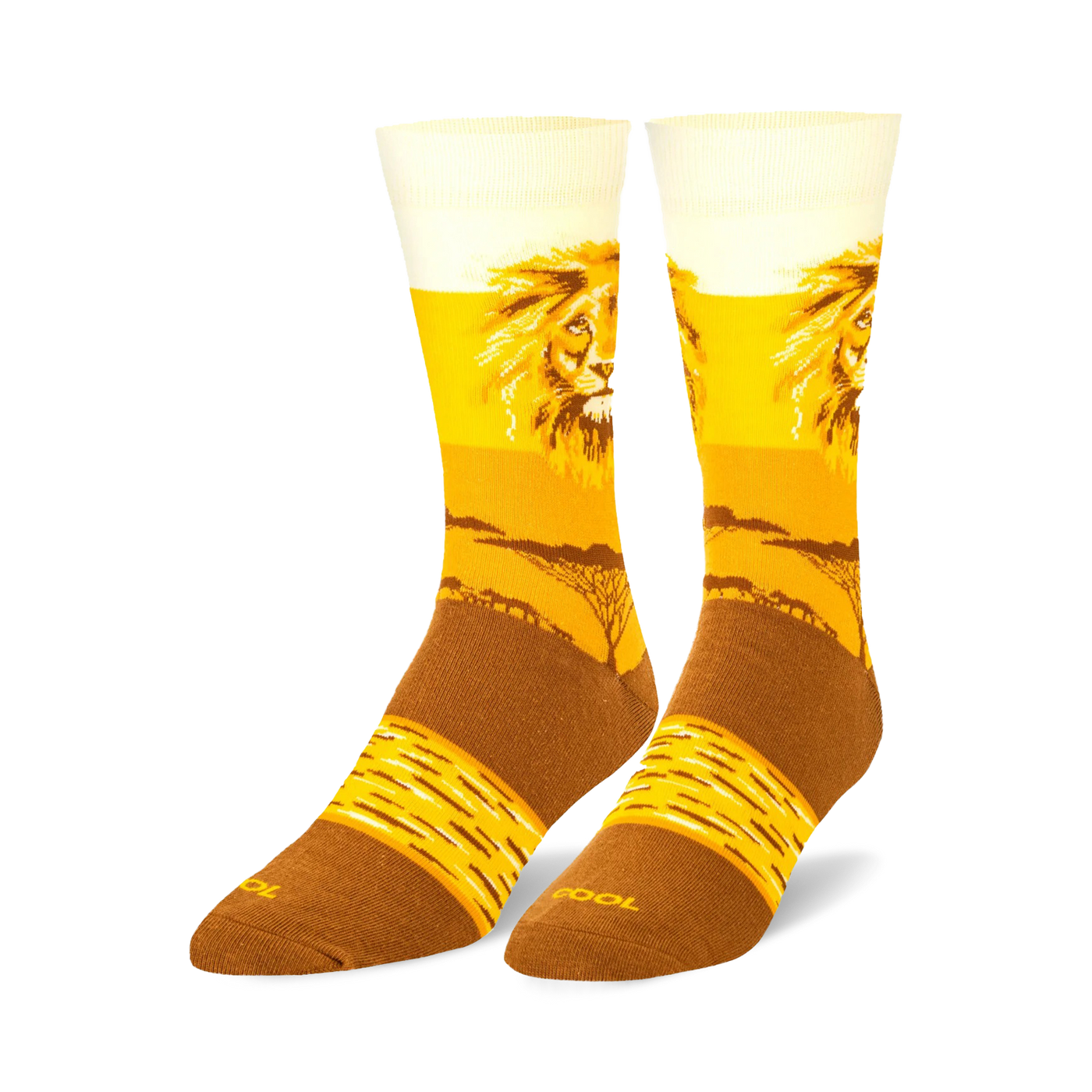 Pair of crew socks, gold and brown, featuring a majestic lion's face and a savanna landscape.
