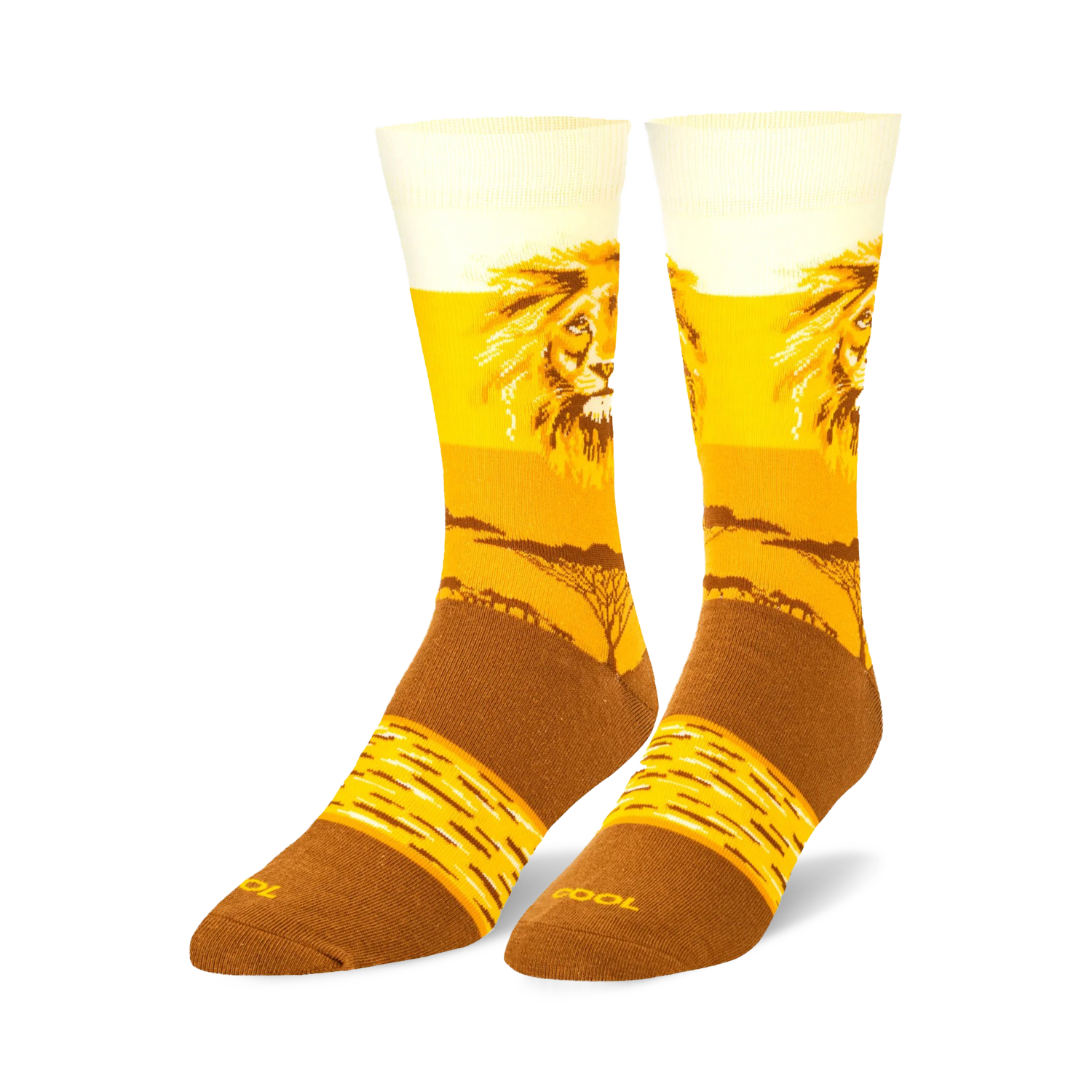 Pair of crew socks, gold and brown, featuring a majestic lion's face and a savanna landscape.