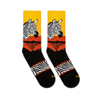 Flat lay of two Zebra Safari socks facing left, showing the sunset gradient, zebra head, tree silhouettes, and striped arch.