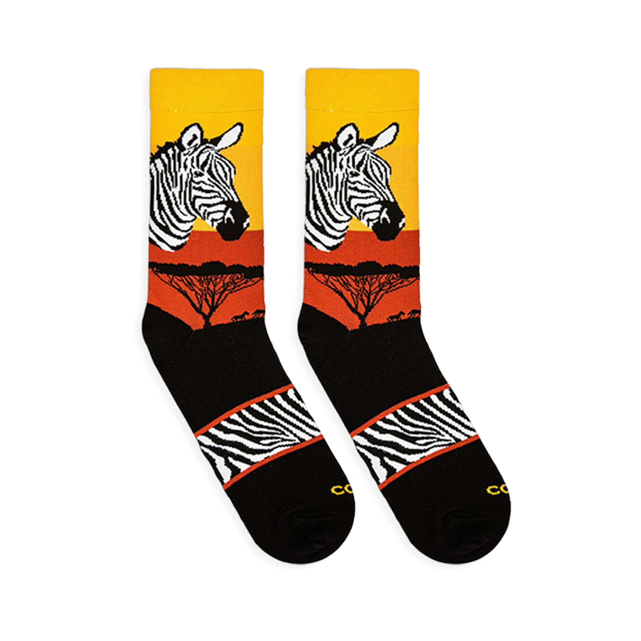 Flat lay of two Zebra Safari socks facing left, showing the sunset gradient, zebra head, tree silhouettes, and striped arch.