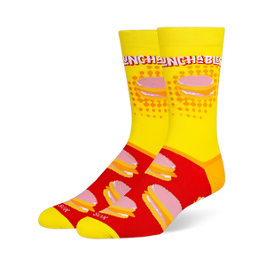 Crew socks featuring a yellow leg with the Lunchables logo and a red foot with a repeating pattern of stacked cracker snacks.
