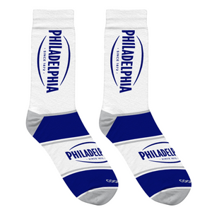 Close-up shot of a pair of Philadelphia Cream Cheese socks showcasing the design details.