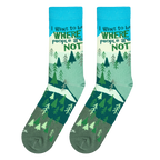 Lifestyle shot: A person's feet wearing the 'Where People Are Not' socks while hiking in nature.