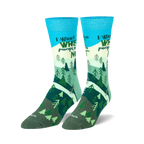 Pair of crew socks; teal, green, and white; features a mountain scene with trees and the phrase 'I want to be where people are not'.