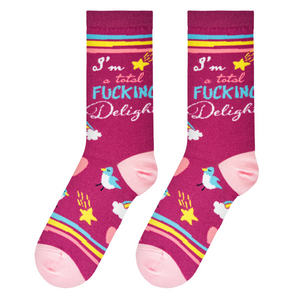 Flat lay showcasing the 'I'm a Total Fucking Delight' socks, highlighting the design details and color combinations.