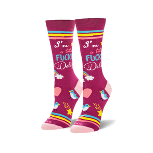 Pair of women's crew socks in fuchsia.  Features a bold 'I'm a total Fucking Delight' text, rainbows, stars, birds, and pink stripes.