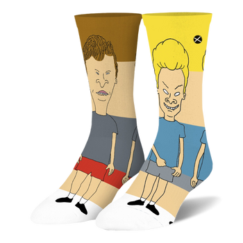 Side view of mismatched socks. One features Butthead on brown and red color blocks, the other Beavis on yellow and blue.