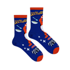 Flat lay of blue socks showing a cereal bowl, spoon, white sparkles, Frosted Flakes logo, and bright orange accents.