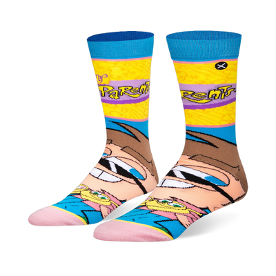 Fairly Odd Parents crew socks featuring a giant Timmy Turner face on the foot and a bright yellow leg with a purple logo.