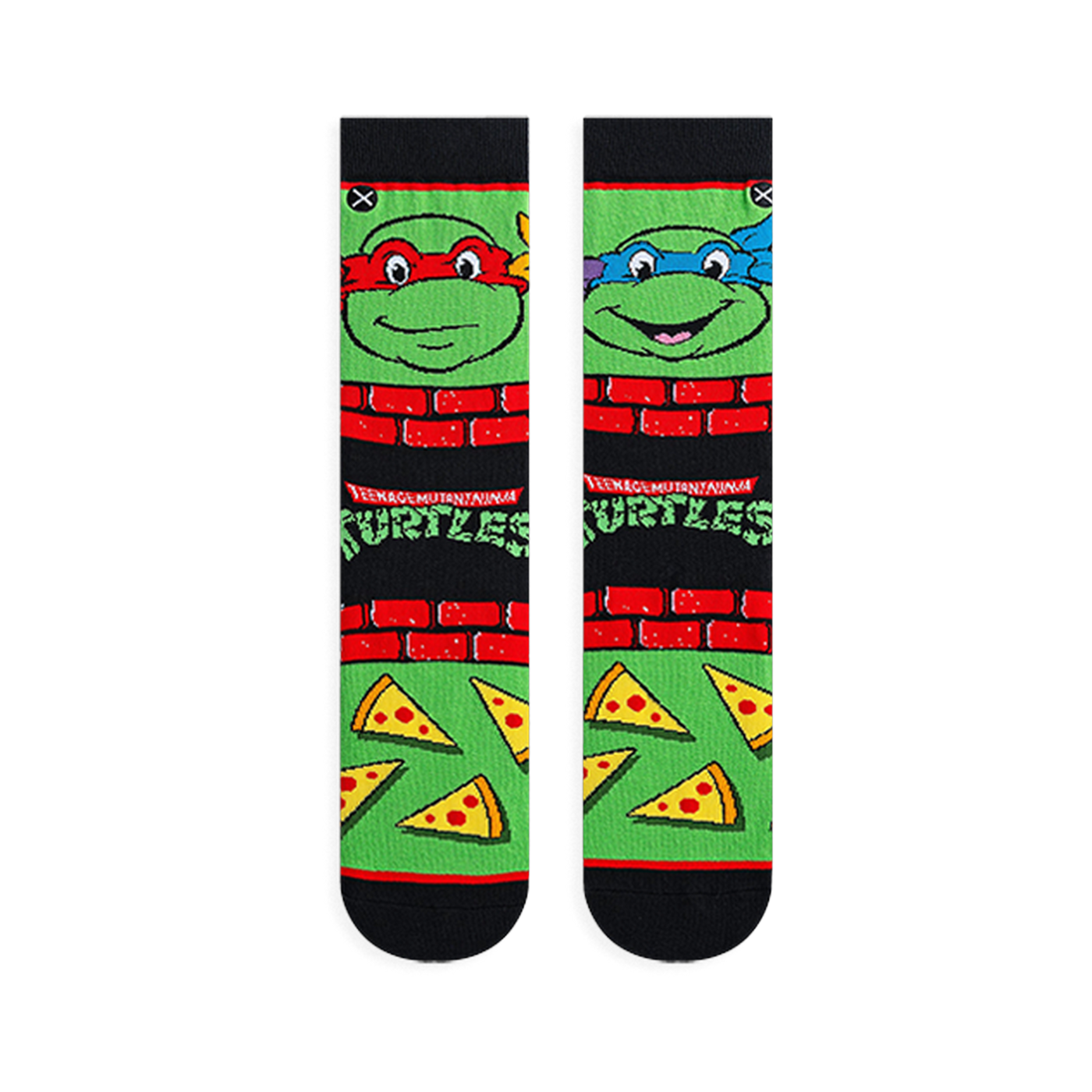 Flat lay of two TMNT socks showing Raphael in red on the left and Leonardo in blue on the right, with pizza slices below.