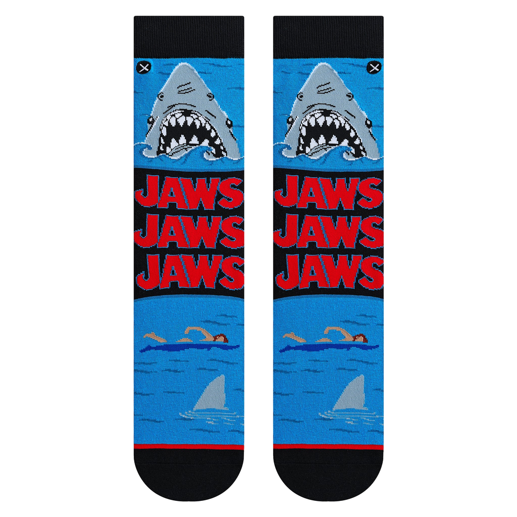 Flatlay showcasing a pair of Jaws Mash Up crew socks; highlighting the sock's design details.